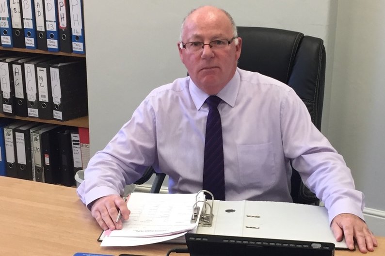 Damian McKinley at his desk